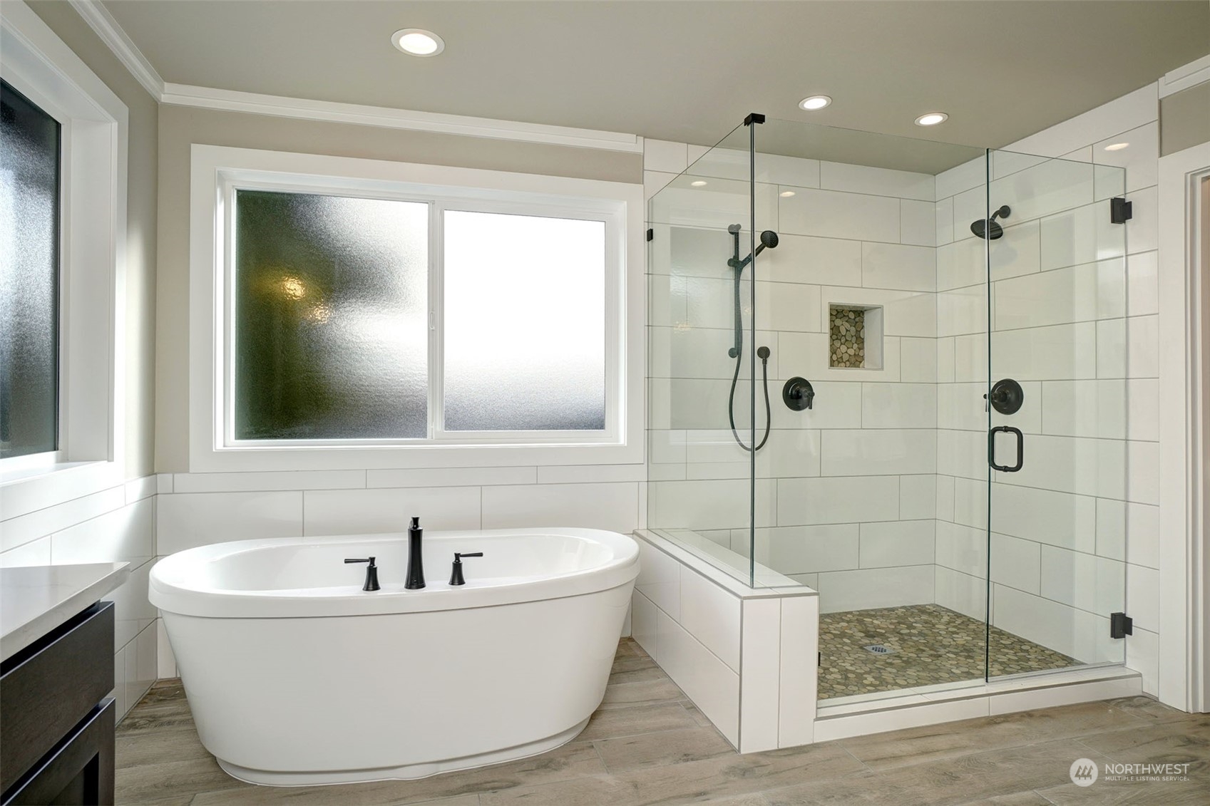 18146 94th Avenue Northeast Bothell, WA 98011 - Photo 30 of 37 a bathroom with a bathtub and shower