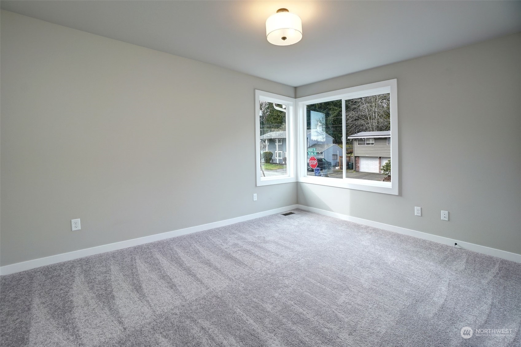 18146 94th Avenue Northeast Bothell, WA 98011 - Photo 33 of 37 a view of an empty room with a window