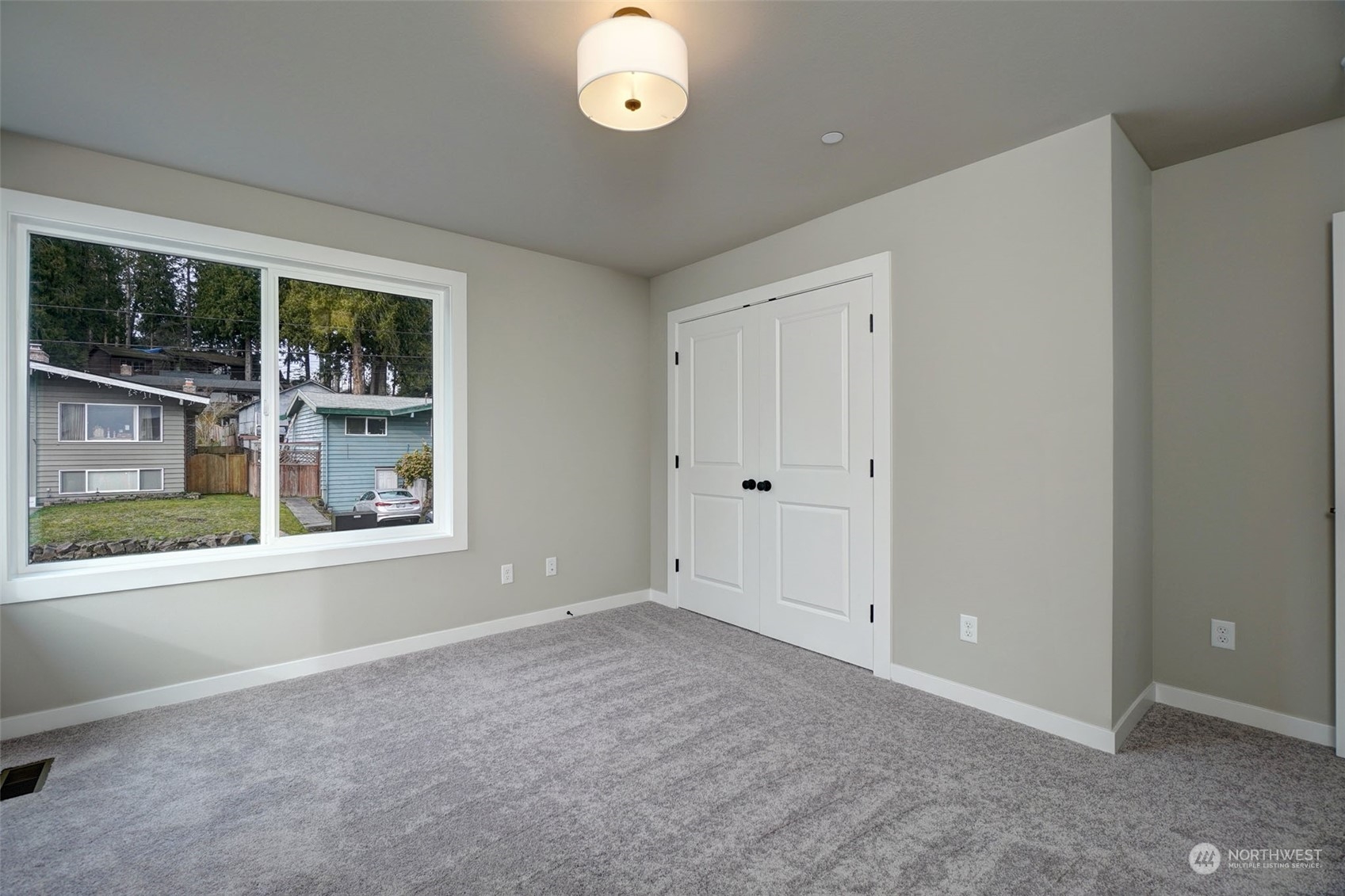 18146 94th Avenue Northeast Bothell, WA 98011 - Photo 34 of 37 a view of an empty room with a window