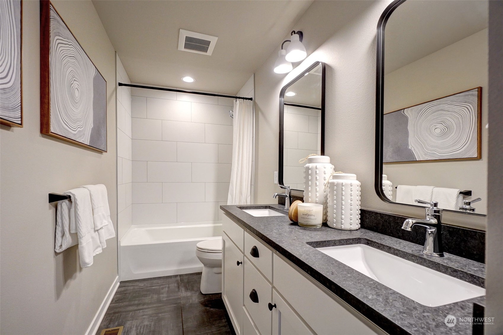 18146 94th Avenue Northeast Bothell, WA 98011 - Photo 35 of 37 a bathroom with double vanity and a bathtub