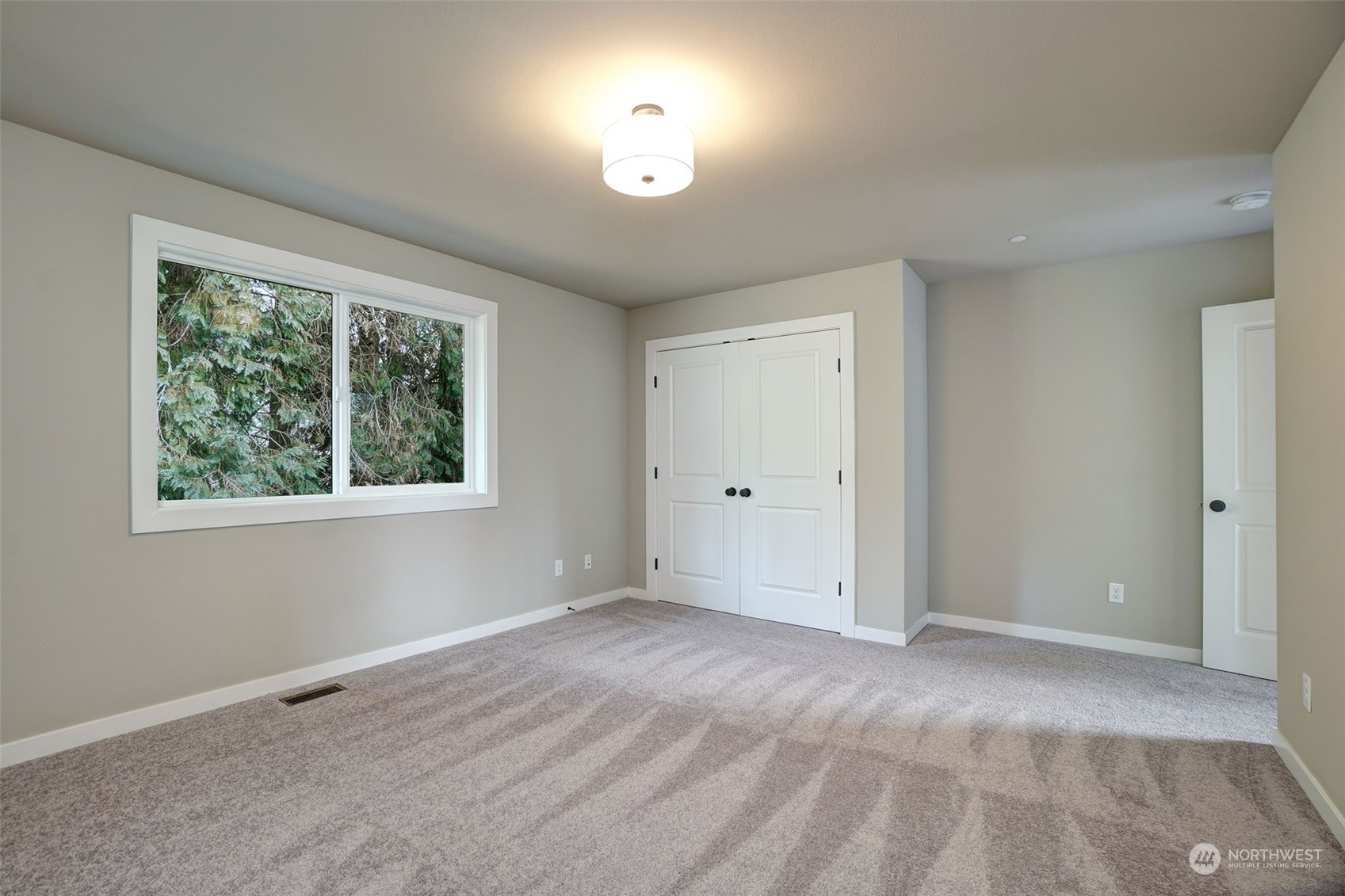 18146 94th Avenue Northeast Bothell, WA 98011 - Photo 37 of 37 a view of an empty room with a window