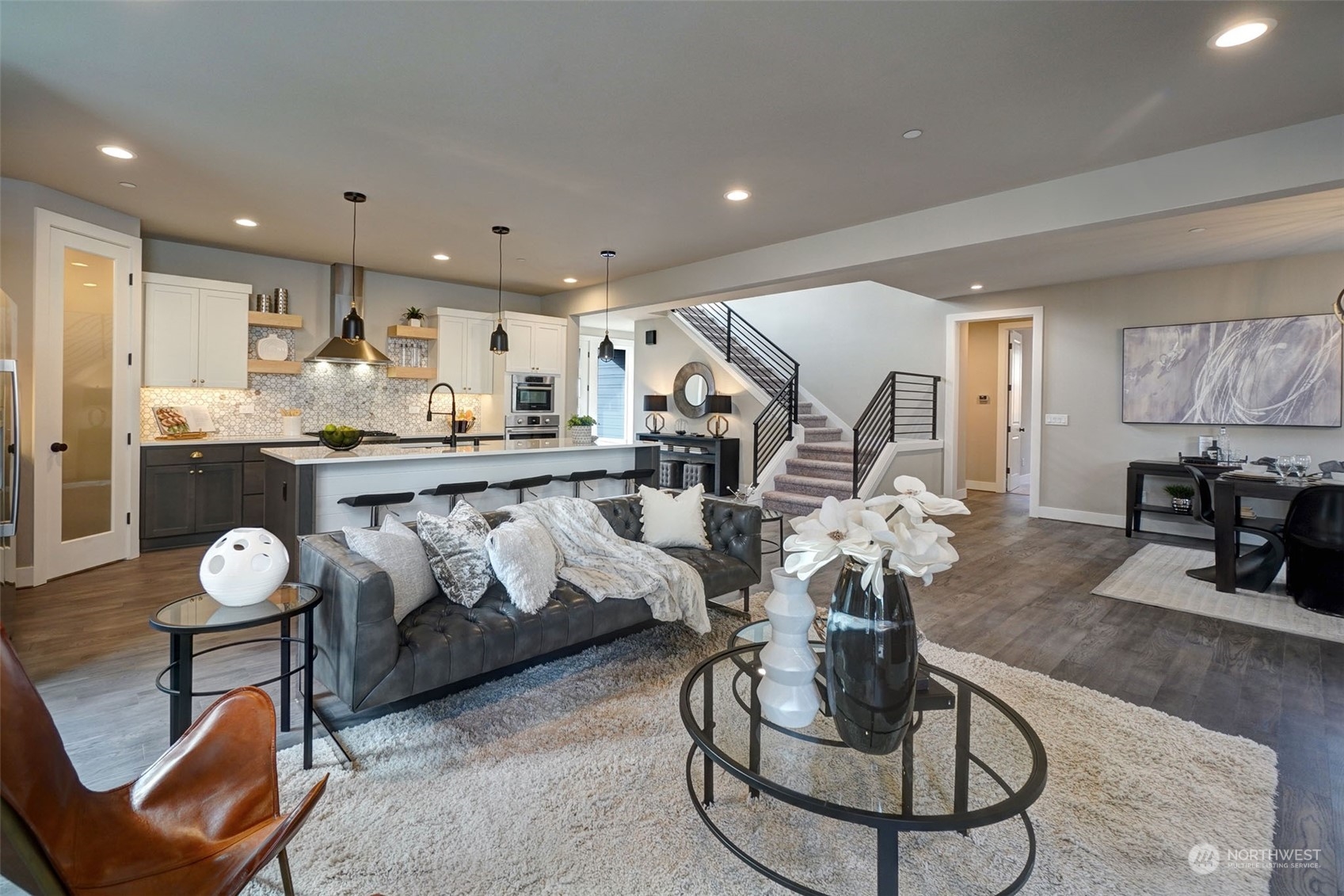 18146 94th Avenue Northeast Bothell, WA 98011 - Photo 10 of 37 a living room with furniture and kitchen view