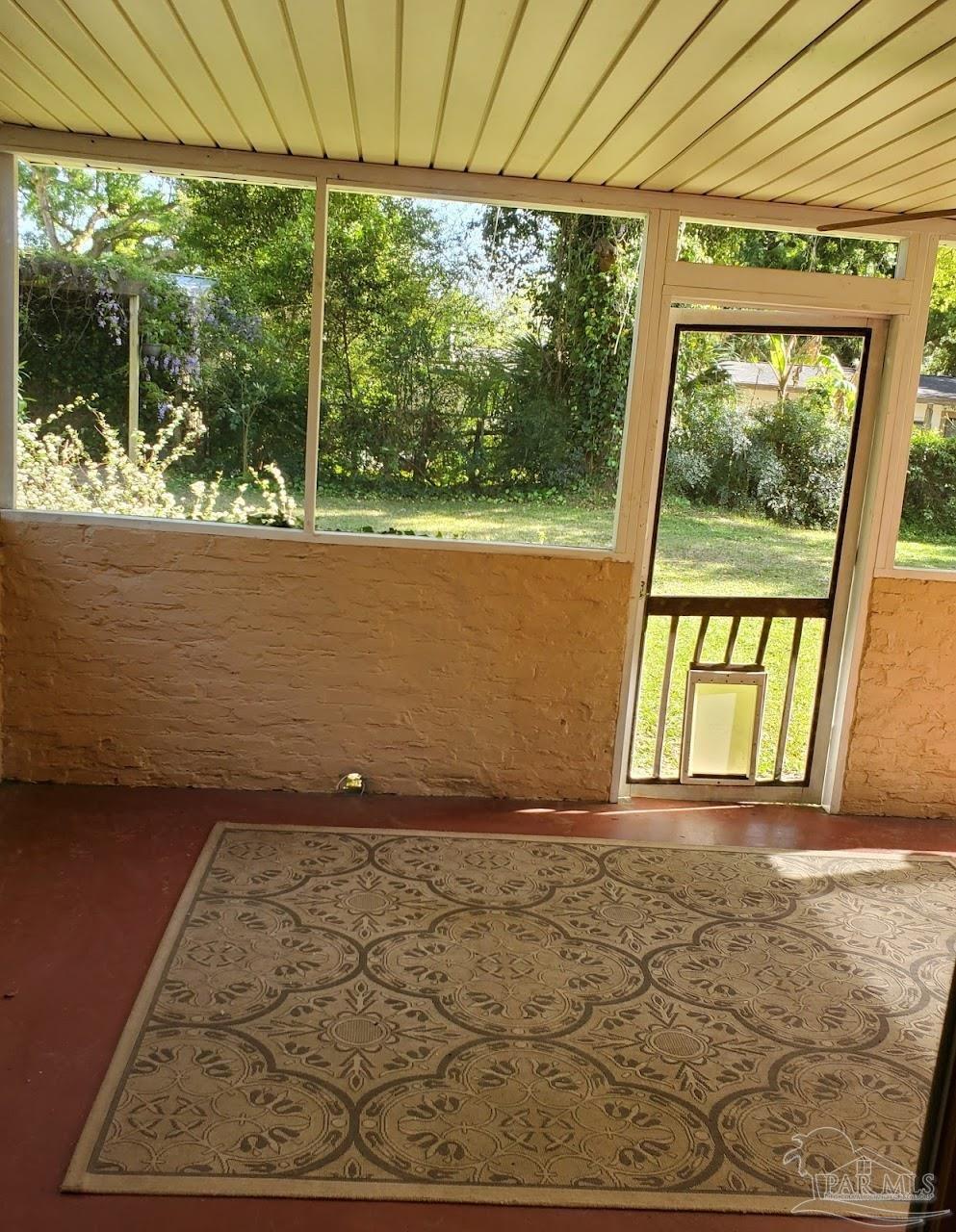 233 Cherokee Trail Pensacola, FL 32506 - Photo 16 of 36 an empty room with large windows