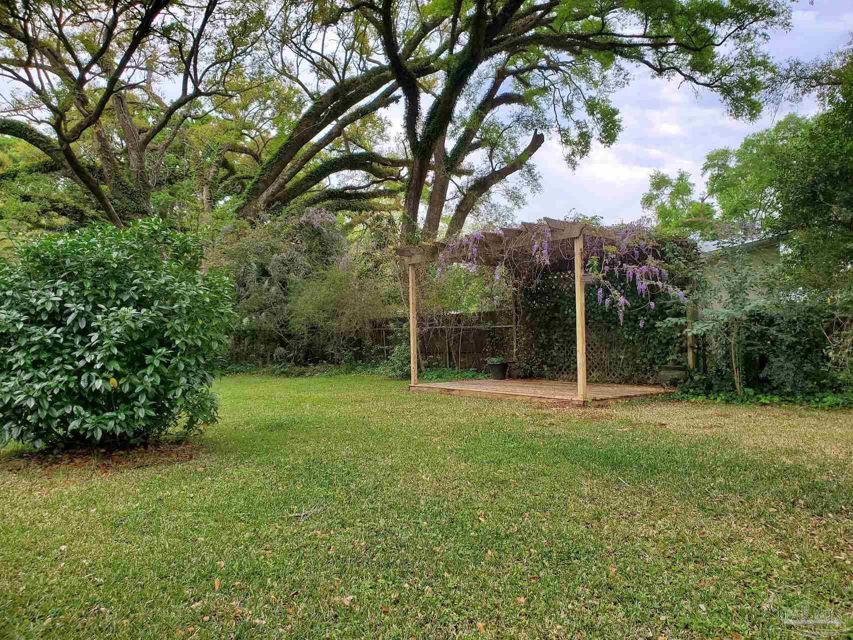 233 Cherokee Trail Pensacola, FL 32506 - Photo 19 of 36 a view of a backyard