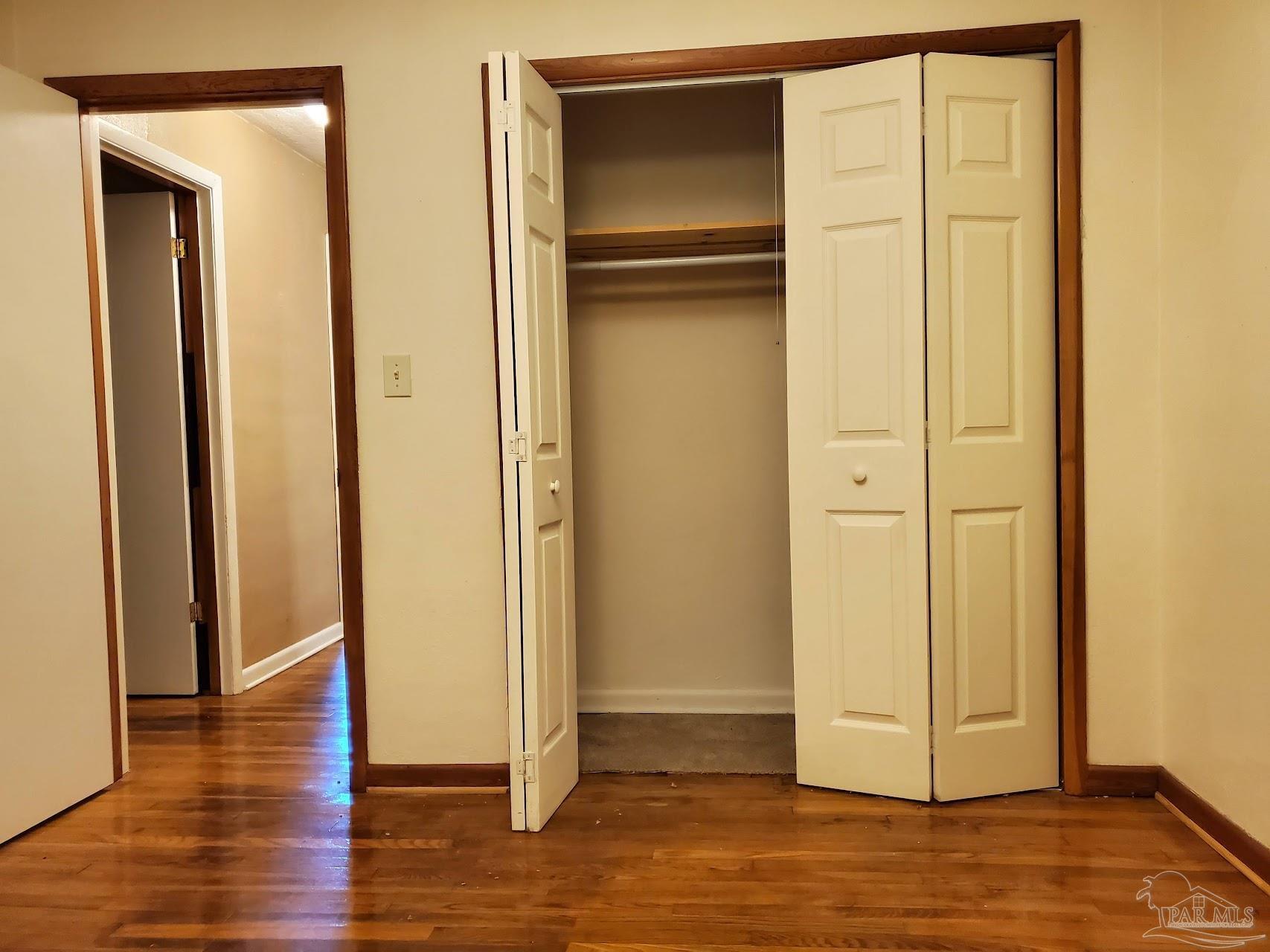 233 Cherokee Trail Pensacola, FL 32506 - Photo 29 of 36 a view of a livingroom with wooden floor