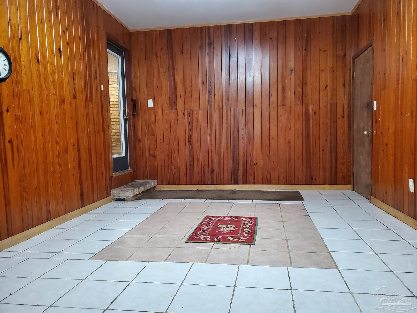 233 Cherokee Trail Pensacola, FL 32506 - Photo 34 of 36 an empty room with a wooden door