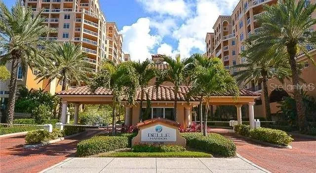 a front view of a building with garden