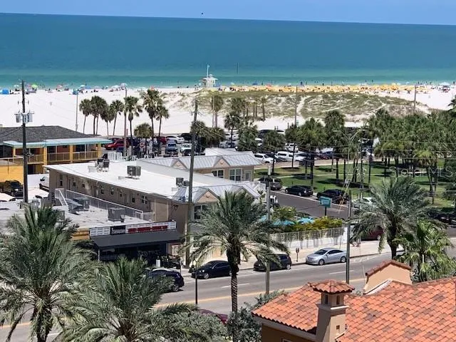 a view of swimming pool with outdoor seating