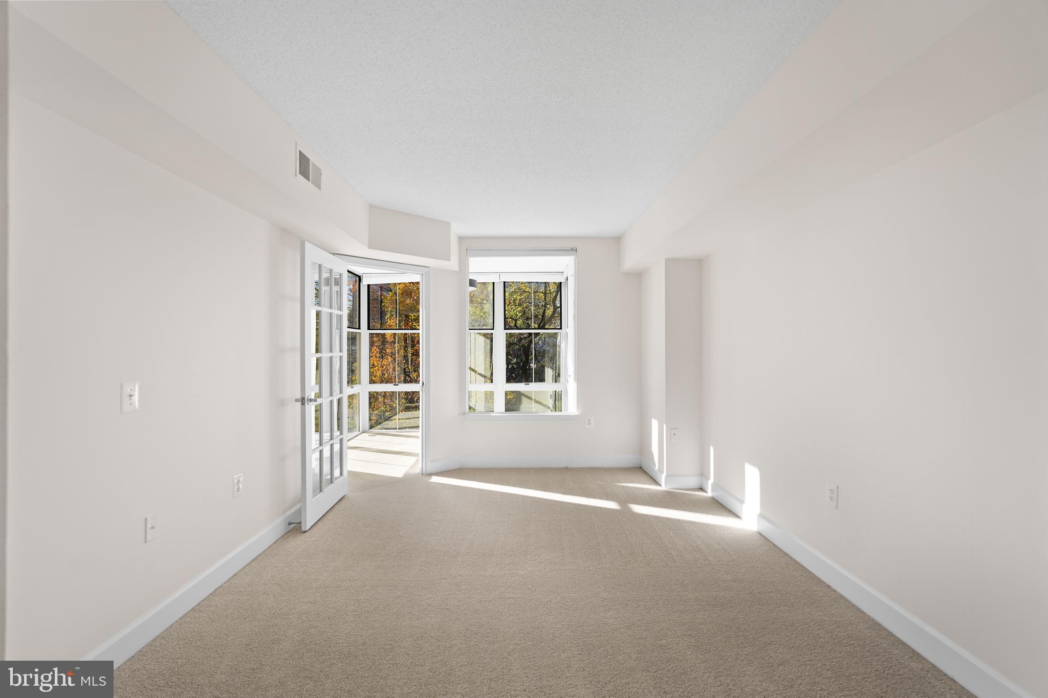 11800 Sunset Hills Road, Unit 611 Reston, VA 20190 - Photo 21 of 40 a view of a room with a large window