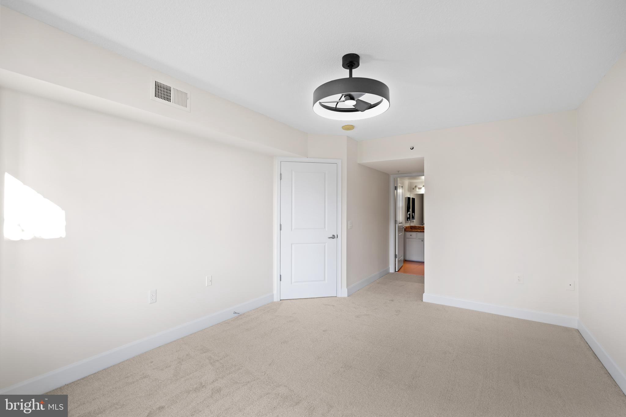 11800 Sunset Hills Road, Unit 611 Reston, VA 20190 - Photo 30 of 40 a view of a room and a ceiling fan