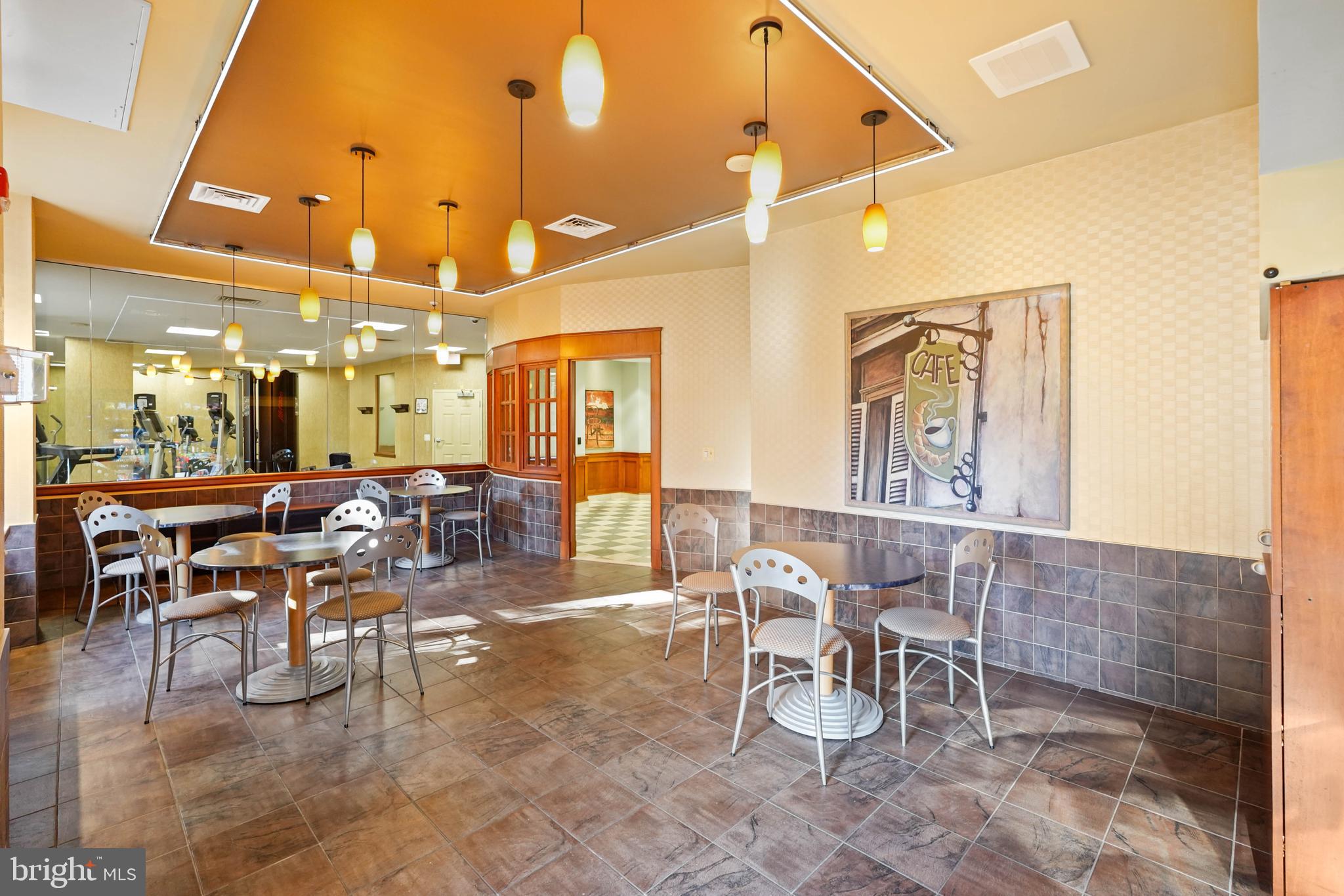 11800 Sunset Hills Road, Unit 611 Reston, VA 20190 - Photo 5 of 40 a outdoor space with lots of chairs and mirrors