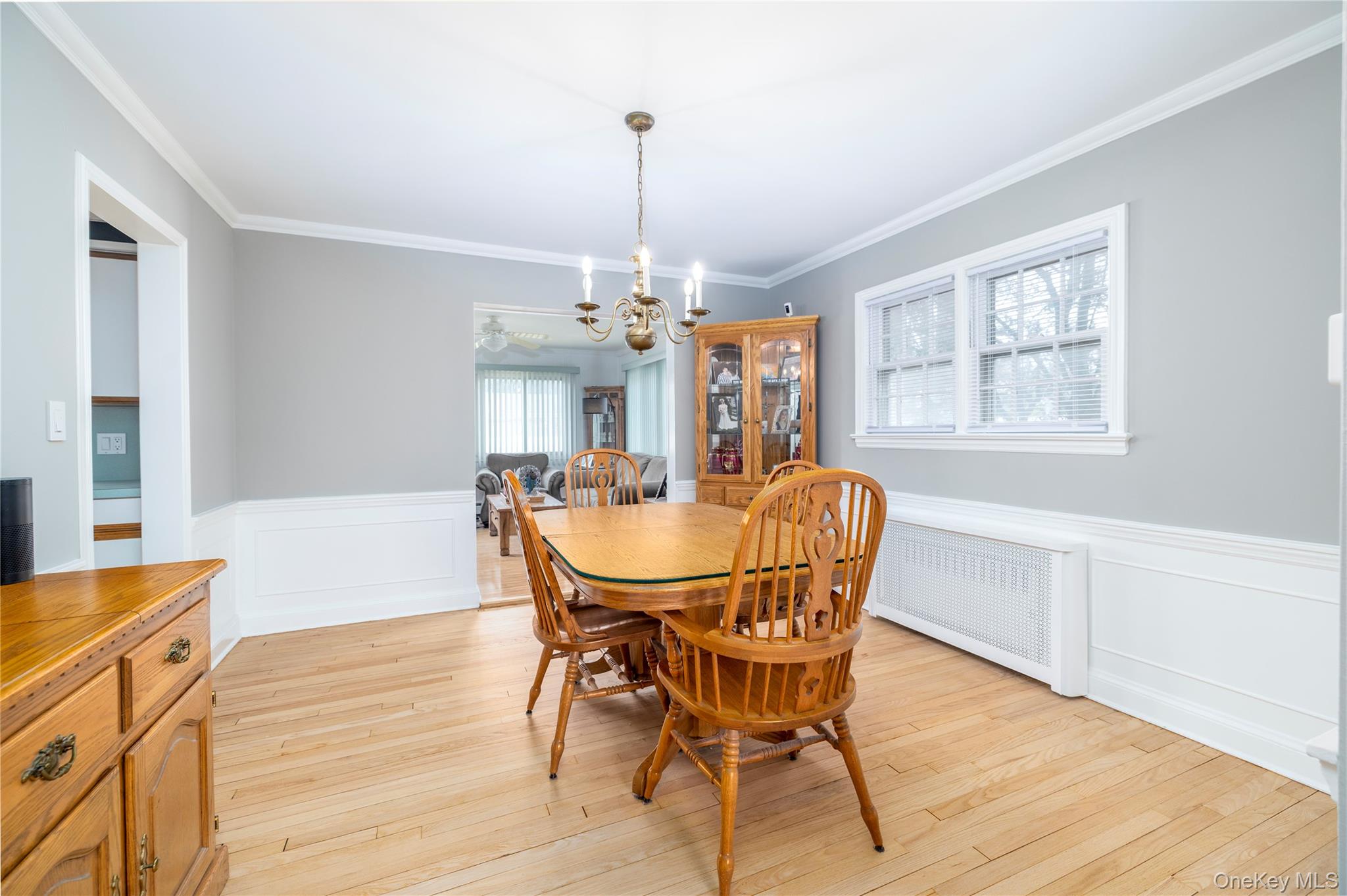 135 Chestnut Street Lynbrook, NY 11563 - Photo 5 of 18 a view of a dining room with furniture window and wooden floor