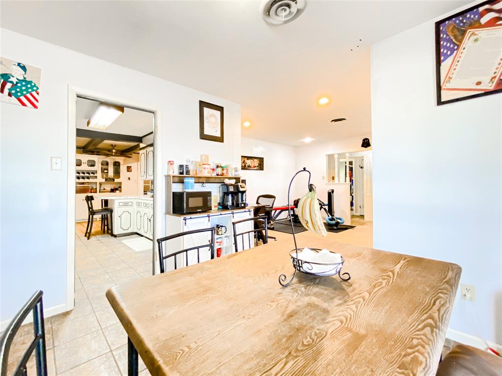 4301 Caprock Road Abilene, TX 79606 - Photo 10 of 29 Bright dining area with wood-finish table
