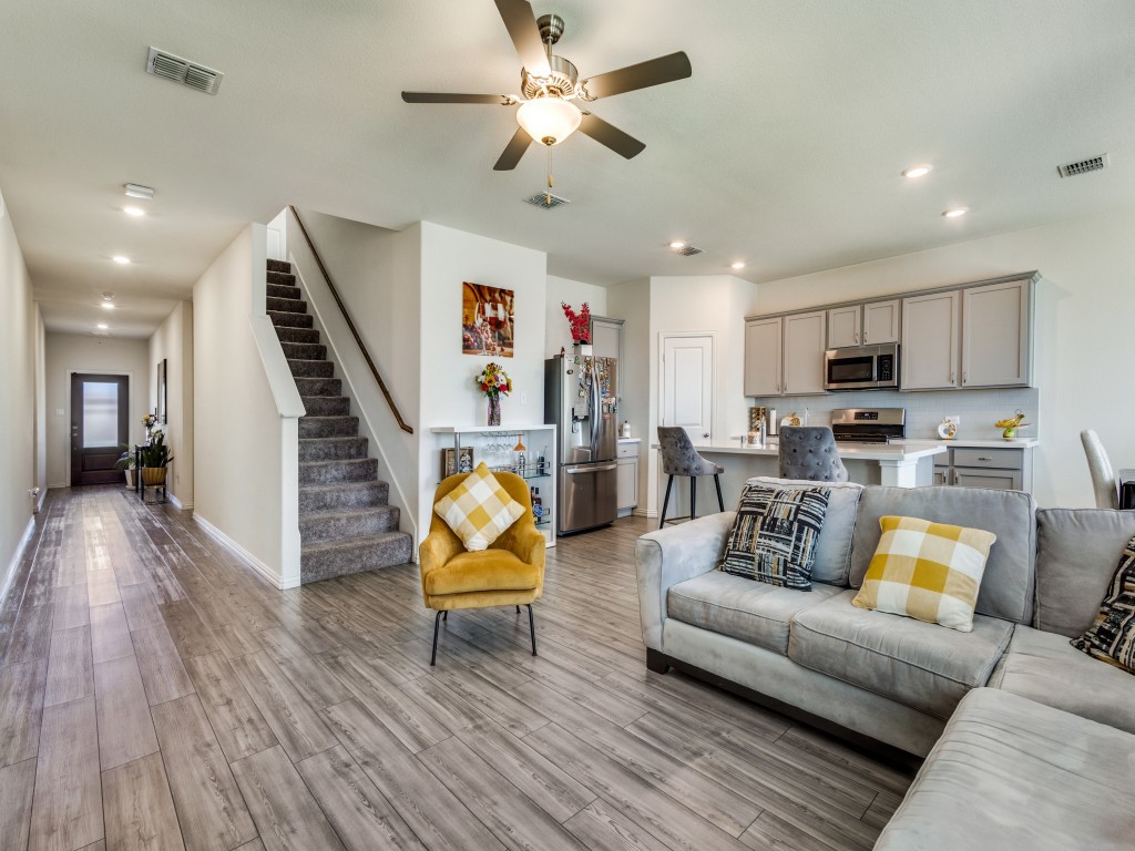 302 Pepperbark Avenue Princeton, TX 75407 - Photo 2 of 12 a living room with furniture and a wooden floor