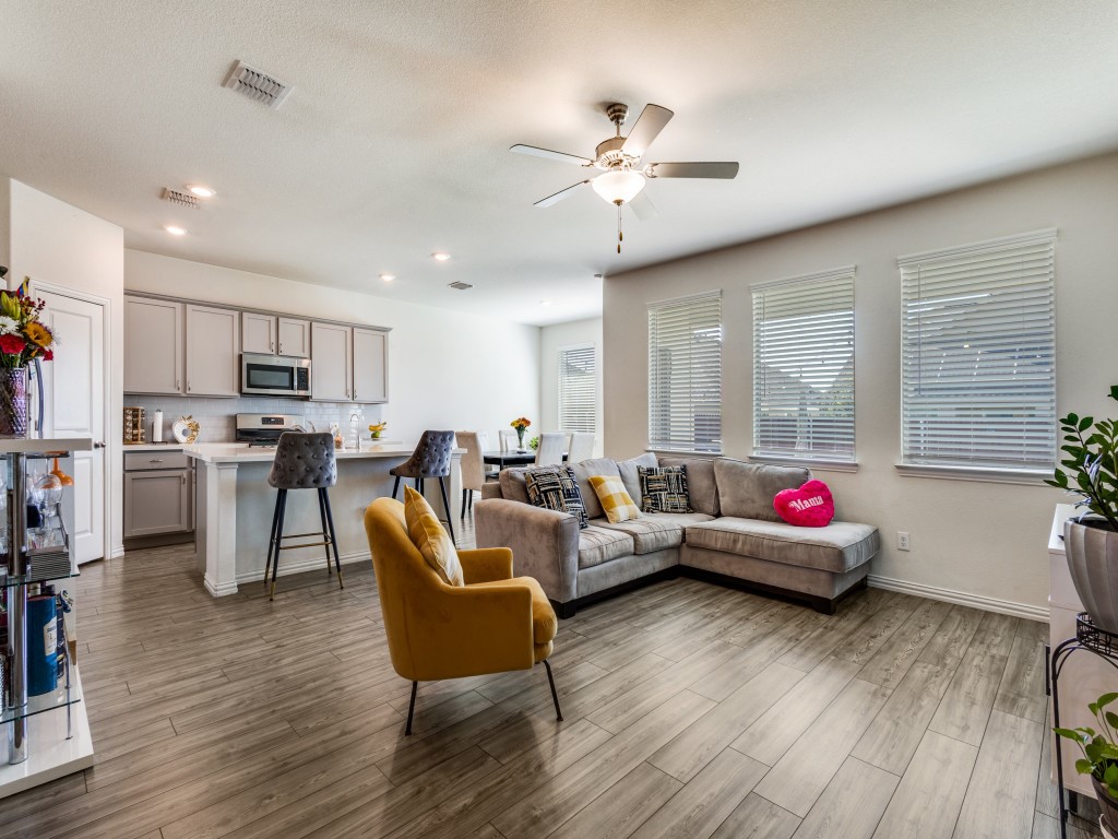 302 Pepperbark Avenue Princeton, TX 75407 - Photo 3 of 12 a living room with furniture and kitchen view