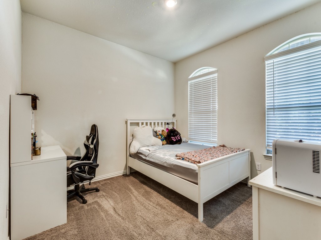 302 Pepperbark Avenue Princeton, TX 75407 - Photo 6 of 12 a bedroom with bed and a window