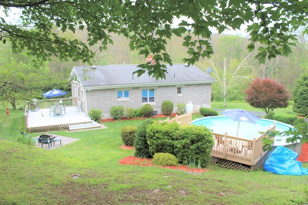121 Wilbraham Road Monson, MA 01057 - Photo 8 of 30 a front view of a house with garden