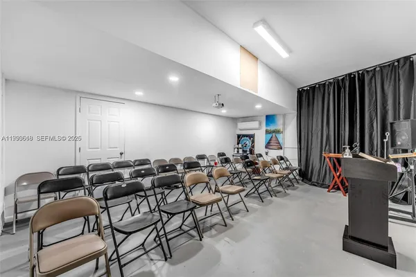 a group of people sitting in a room