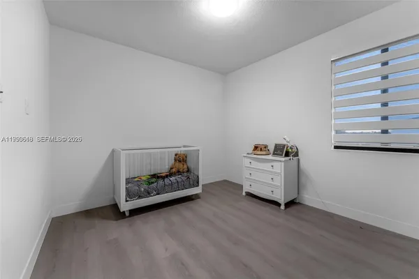 a view of room with hardwood