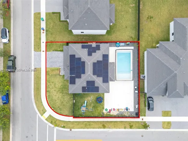 a view of a swimming pool with a chairs