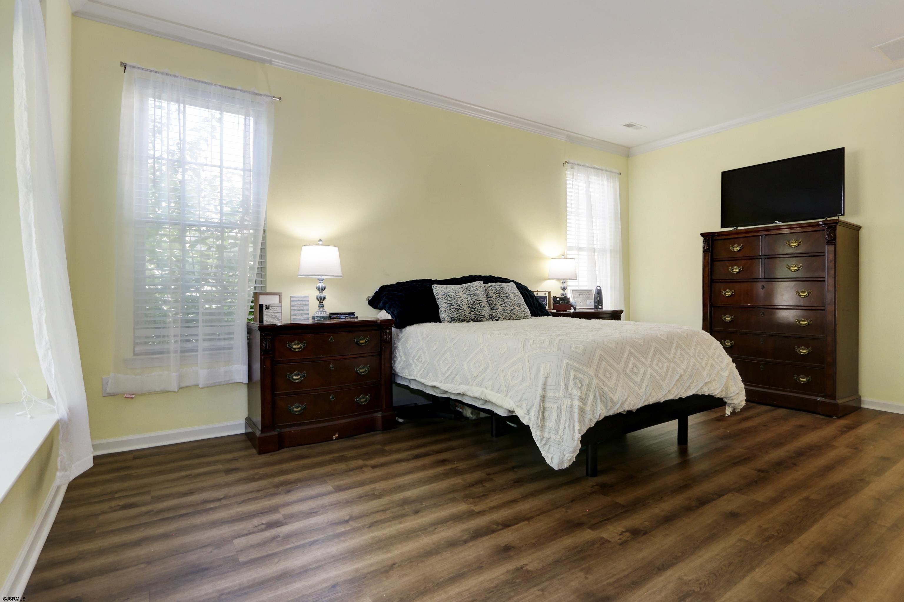 48 Gasko Road Mays Landing, NJ 08330 - Photo 13 of 30 a bedroom with a bed and wooden floor