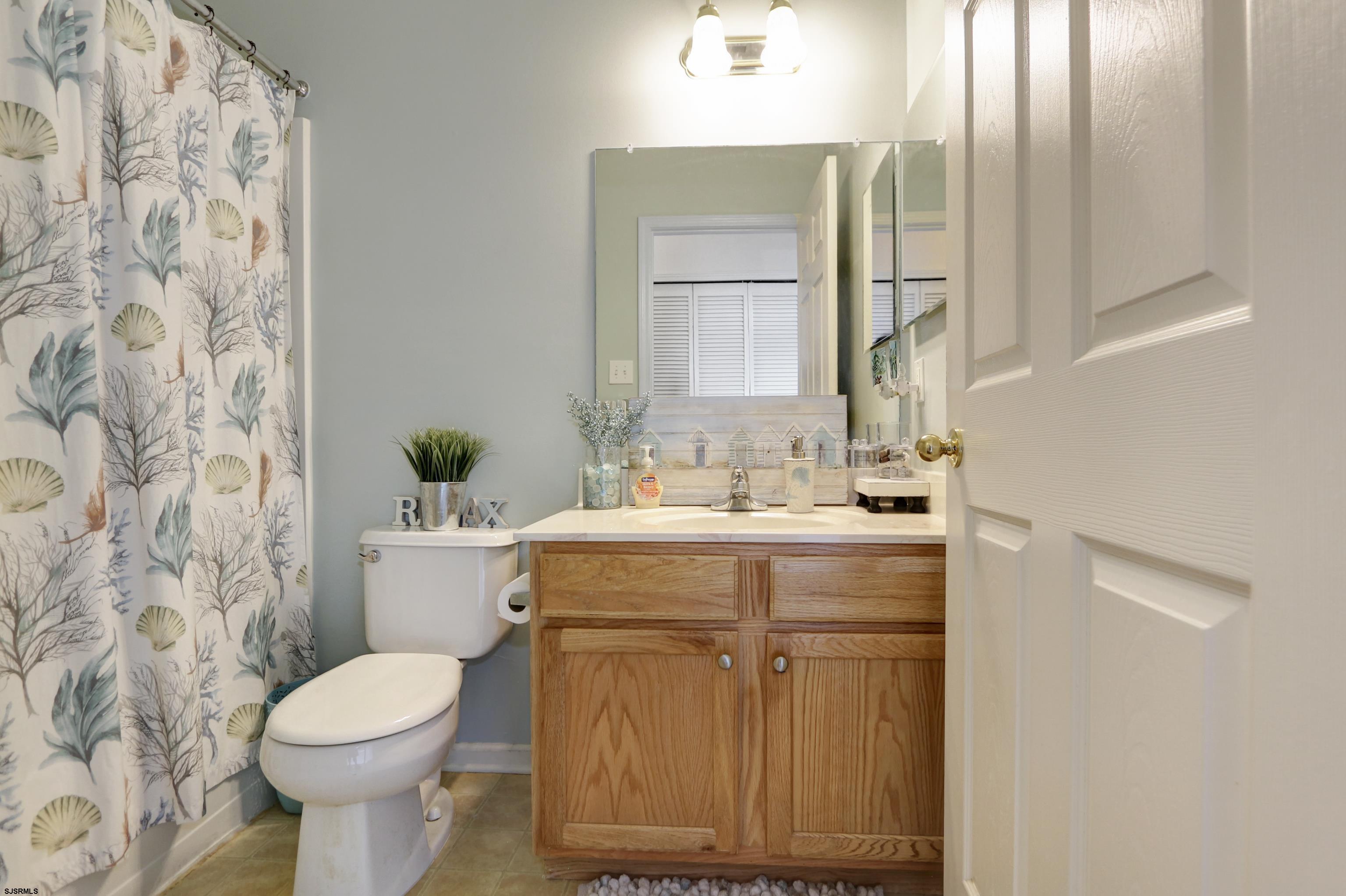 48 Gasko Road Mays Landing, NJ 08330 - Photo 21 of 30 a bathroom with a sink toilet and shower