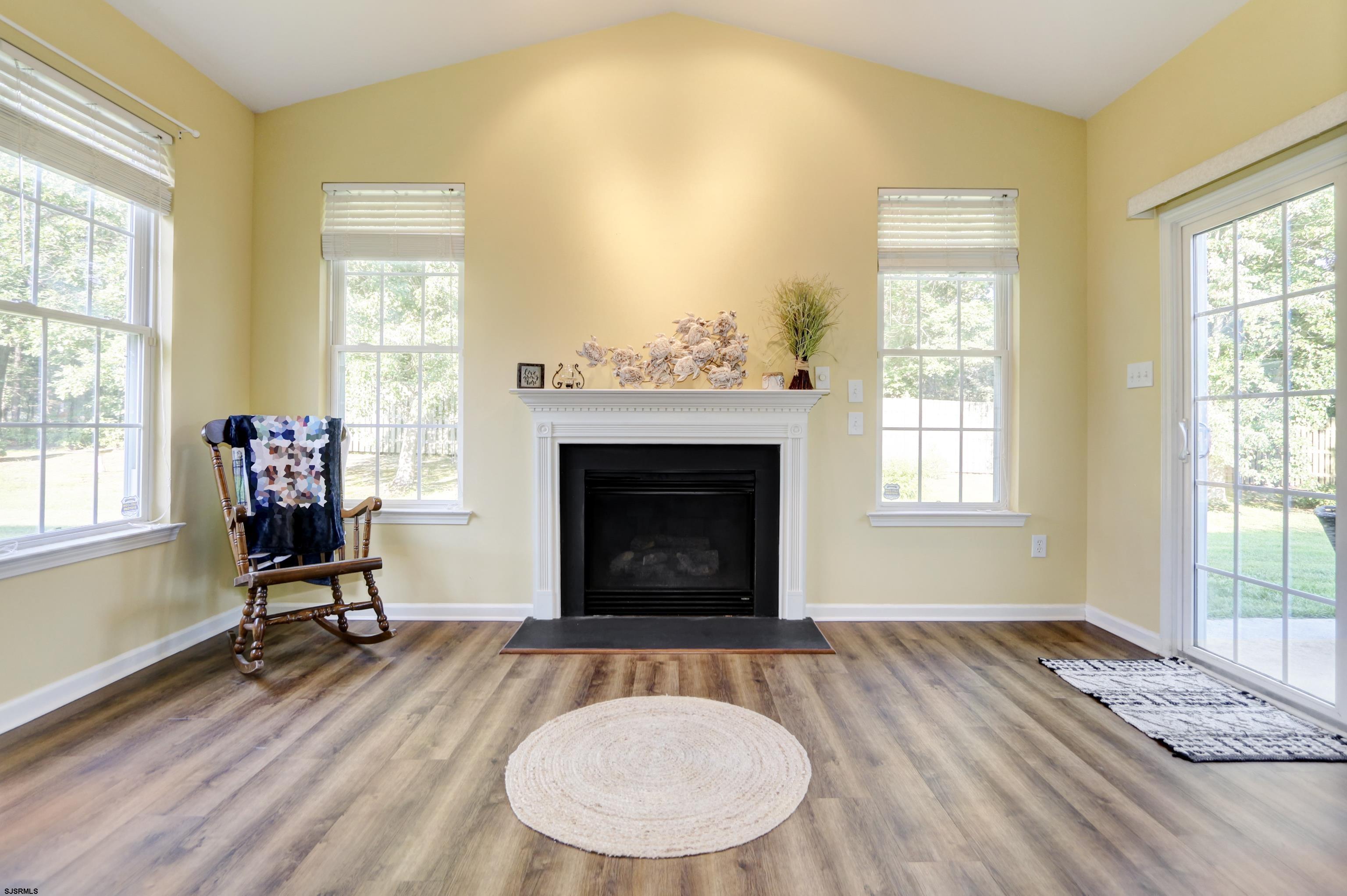 48 Gasko Road Mays Landing, NJ 08330 - Photo 23 of 30 a living room with furniture and a fireplace