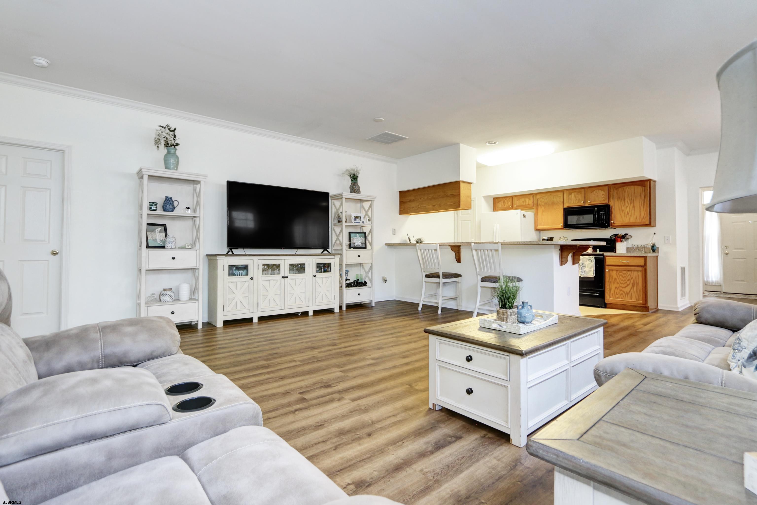 48 Gasko Road Mays Landing, NJ 08330 - Photo 4 of 30 a large living room with furniture and a flat screen tv