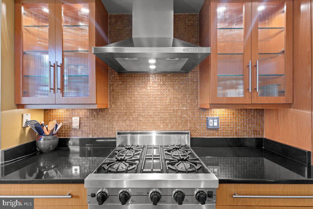 2816 27th Street Northwest Washington, DC 20008 - Photo 16 of 81 a kitchen with stainless steel appliances granite countertop a stove and a sink
