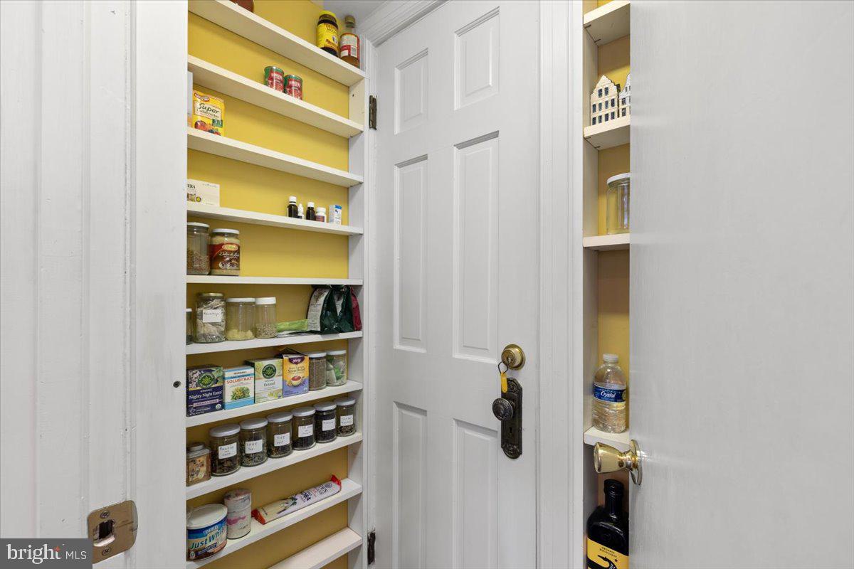 2816 27th Street Northwest Washington, DC 20008 - Photo 20 of 81 a view of walk in closet with empty racks