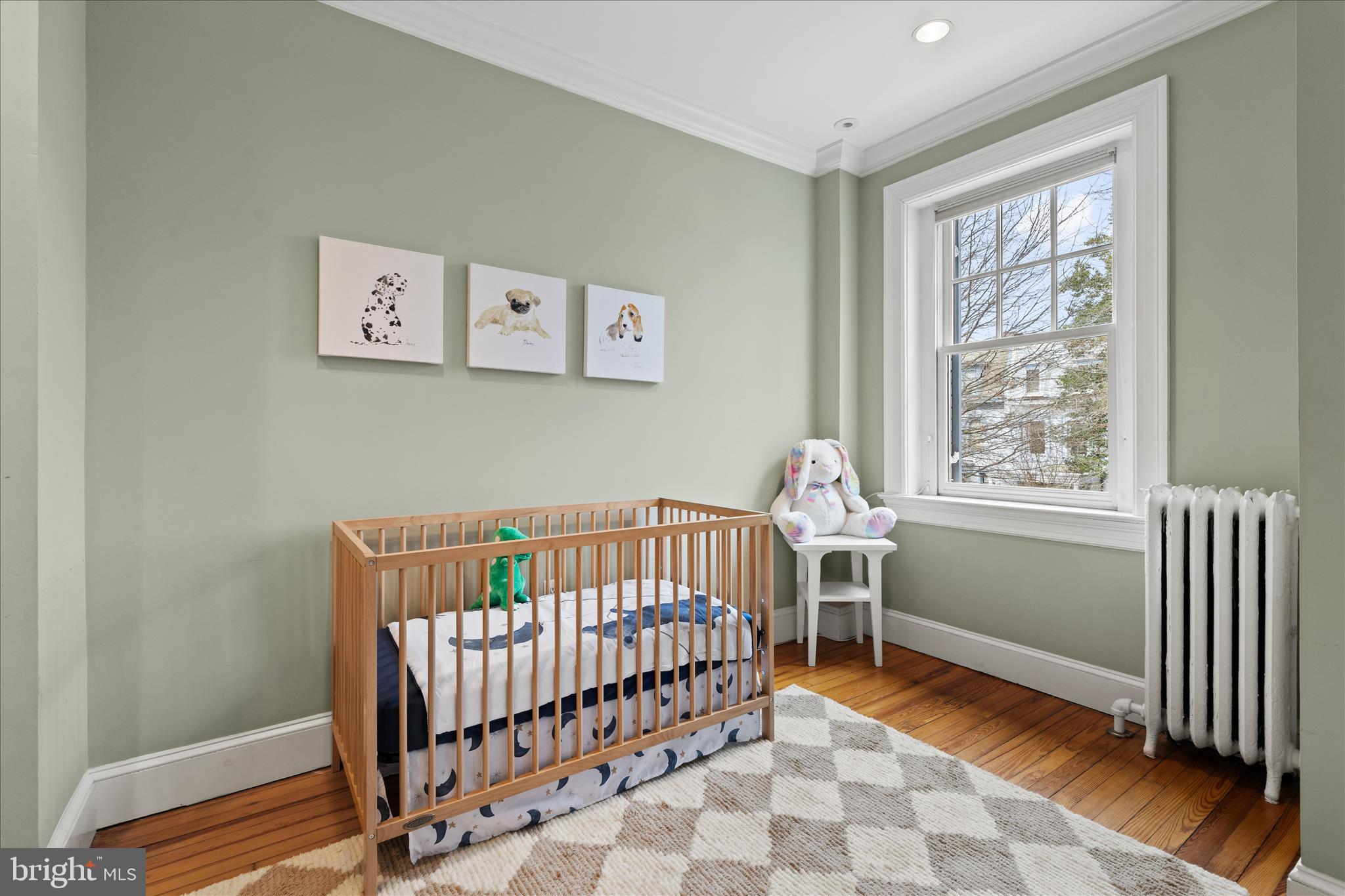 2816 27th Street Northwest Washington, DC 20008 - Photo 34 of 81 a bedroom with a bed and a window