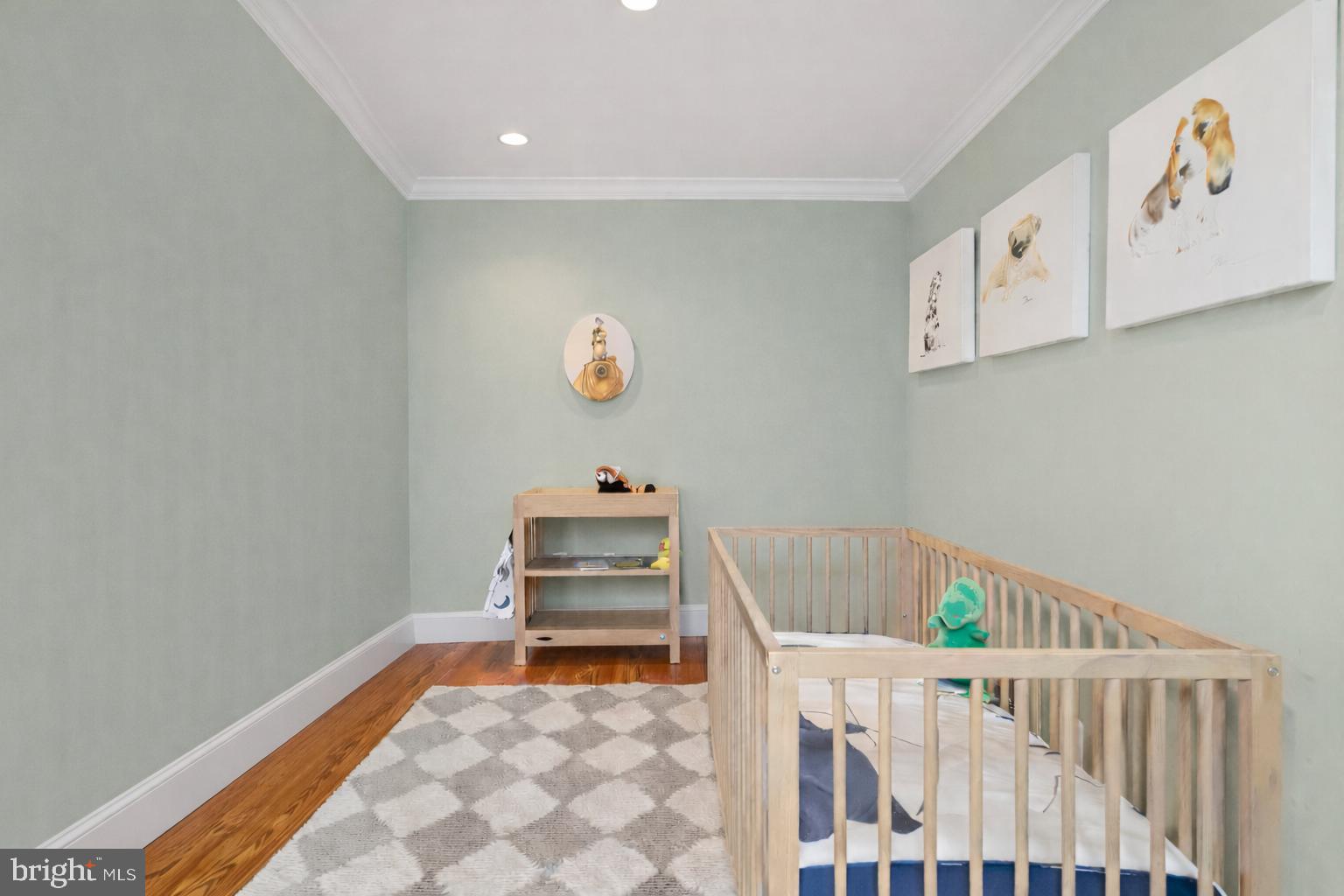 2816 27th Street Northwest Washington, DC 20008 - Photo 36 of 81 a bedroom with furniture and wooden floor