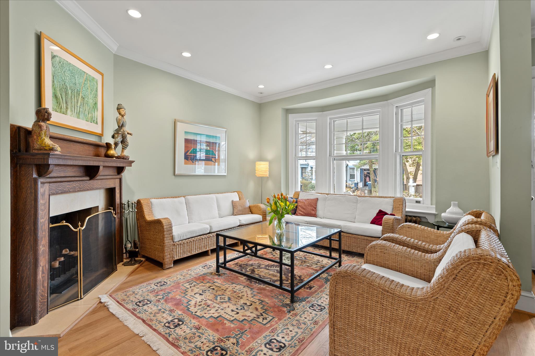 2816 27th Street Northwest Washington, DC 20008 - Photo 4 of 81 a living room with furniture and a fireplace