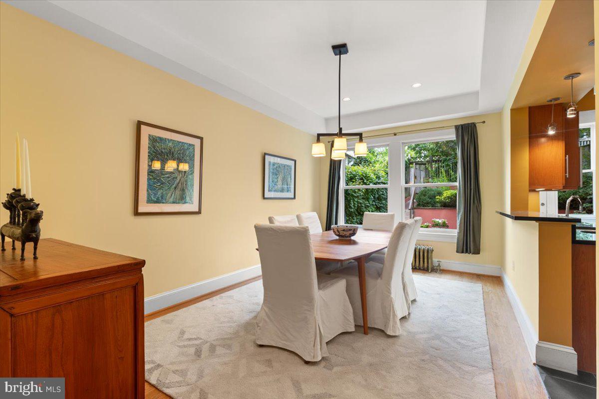 2816 27th Street Northwest Washington, DC 20008 - Photo 8 of 81 a dining room with furniture a chandelier and wooden floor