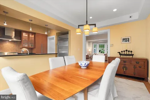 a kitchen with stainless steel appliances granite countertop a stove and a sink