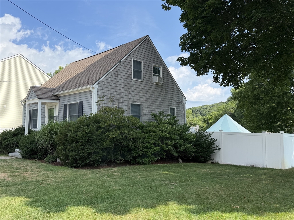 29 Pilgrim Road Weymouth, MA 02191 - Photo 4 of 38 a view of a house with a yard