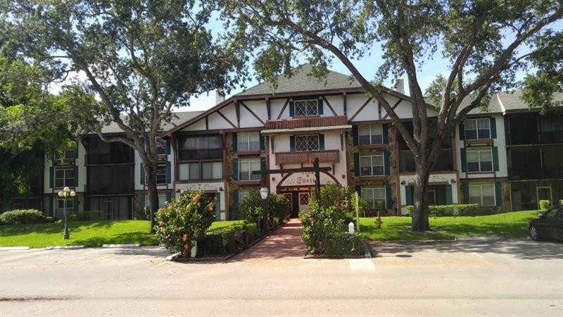 3750 Inverrary Drive, Unit Z2F Lauderhill, FL 33319 - Photo 1 of 12 front view of a house with a yard
