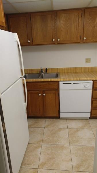 3750 Inverrary Drive, Unit Z2F Lauderhill, FL 33319 - Photo 2 of 12 a kitchen with a cabinets