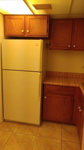 3750 Inverrary Drive, Unit Z2F Lauderhill, FL 33319 - Photo 4 of 12 a view of a refrigerator with storage