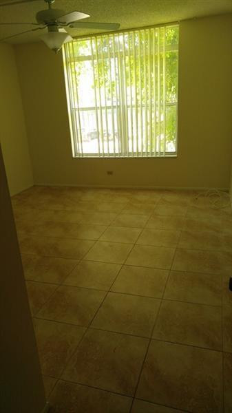 3750 Inverrary Drive, Unit Z2F Lauderhill, FL 33319 - Photo 7 of 12 a bathroom with a window