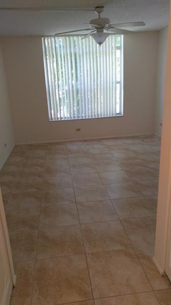 3750 Inverrary Drive, Unit Z2F Lauderhill, FL 33319 - Photo 9 of 12 a view of an empty room and window