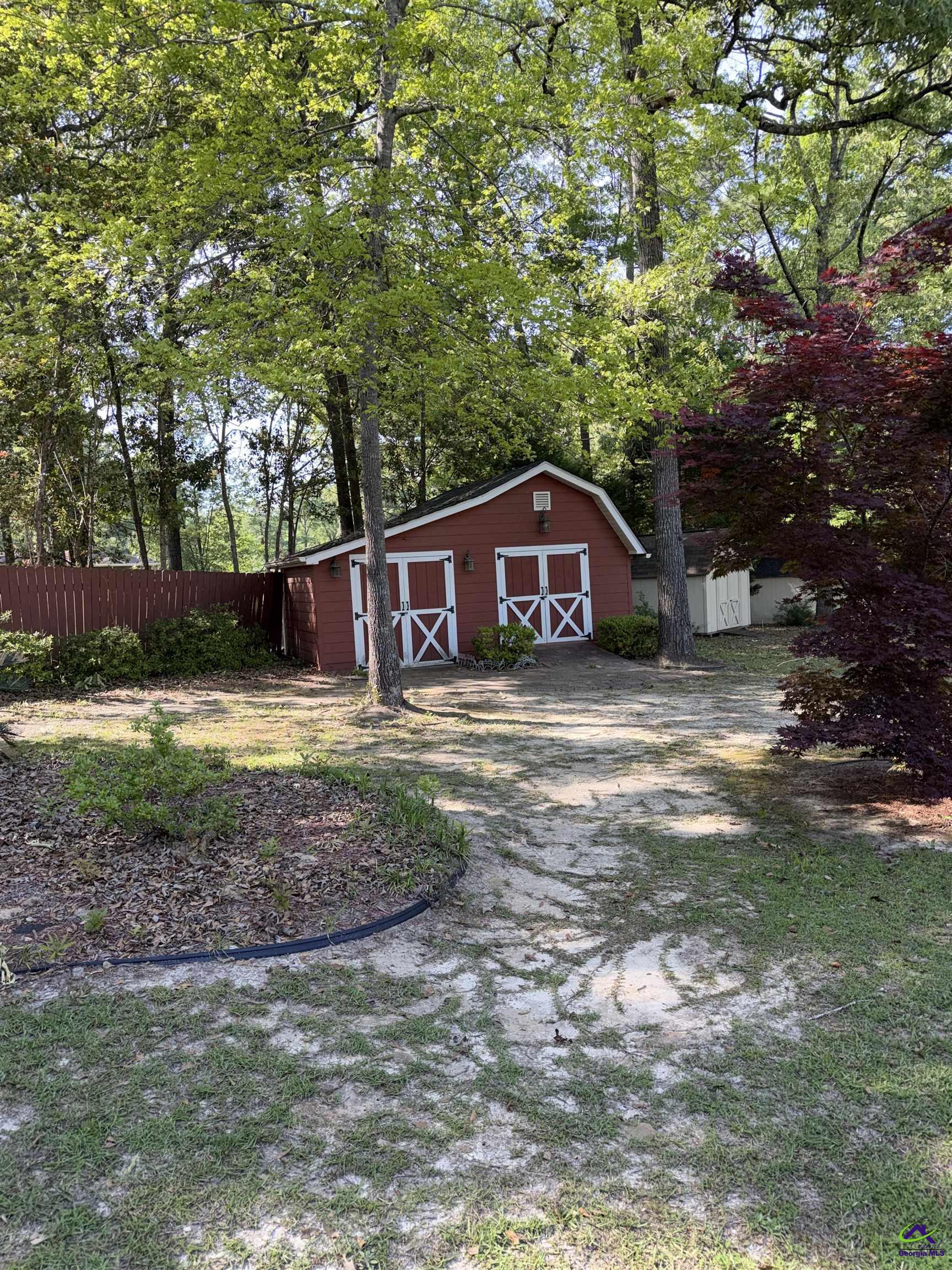 249 Hatcher Road Warner Robins, GA 31088 - Photo 24 of 25 a view of house with a yard