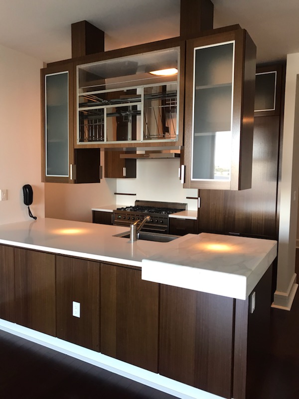 a kitchen with a sink and an oven