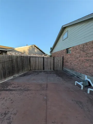 a view of a road with a building in the background
