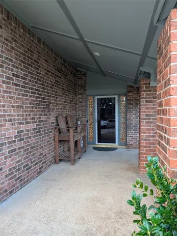 a view of livingroom with furniture and natural light