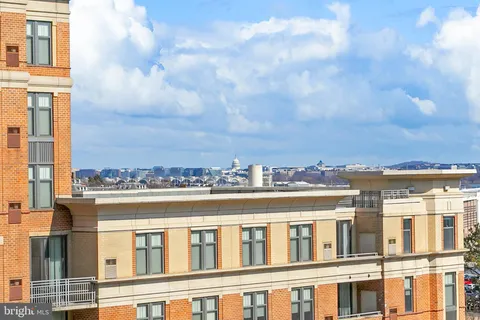a view of a large building with a city view