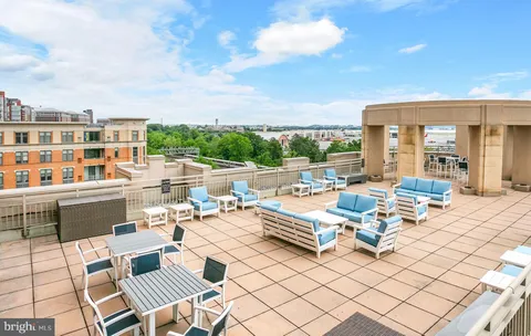 a view of a terrace with seating area