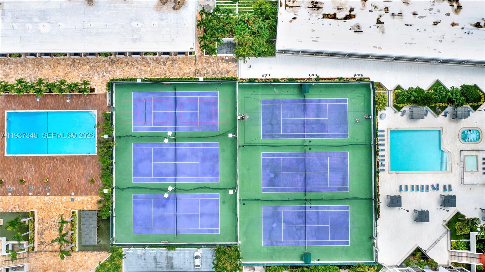 1901 Brickell Avenue, Unit B711 Miami, FL 33129 - Photo 27 of 41 a view of front a building with a garden and plants