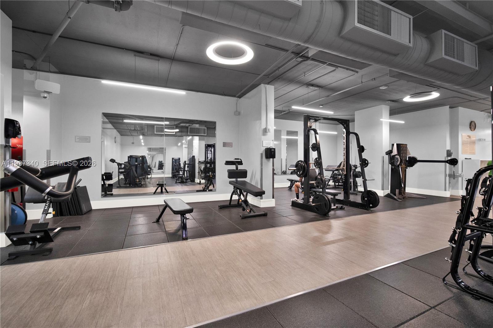1901 Brickell Avenue, Unit B711 Miami, FL 33129 - Photo 33 of 41 a view of a room with gym equipment