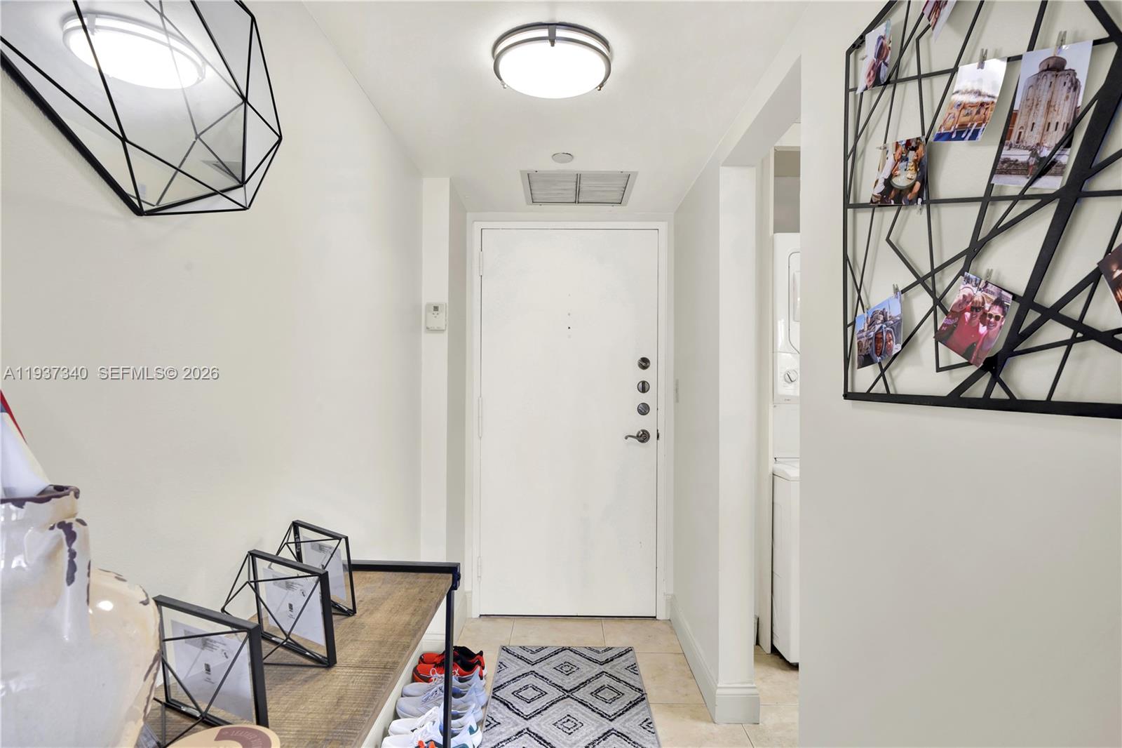 1901 Brickell Avenue, Unit B711 Miami, FL 33129 - Photo 8 of 41 a view of an entryway with wooden floor